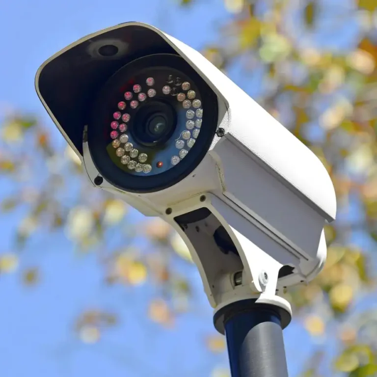 A close-up of an outdoor security camera with infrared LEDs.